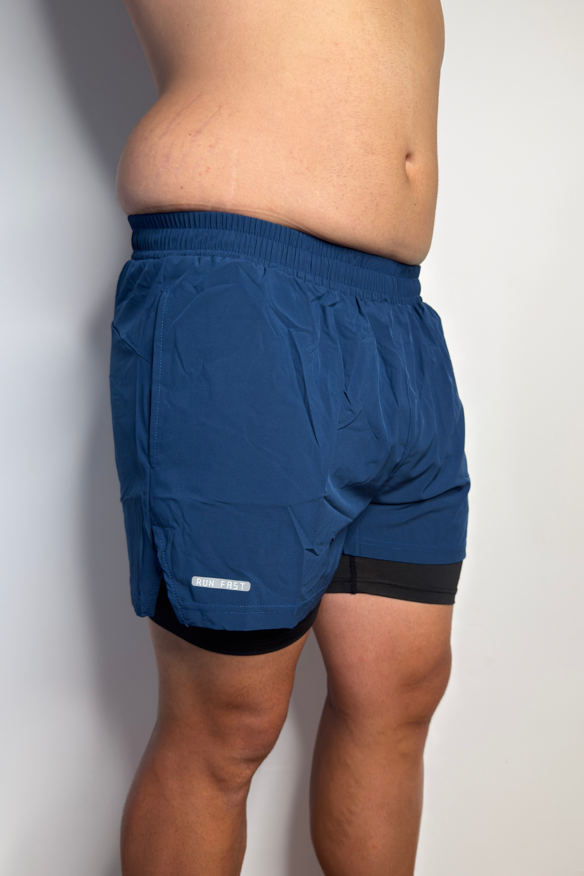 Short FASTER Homme
